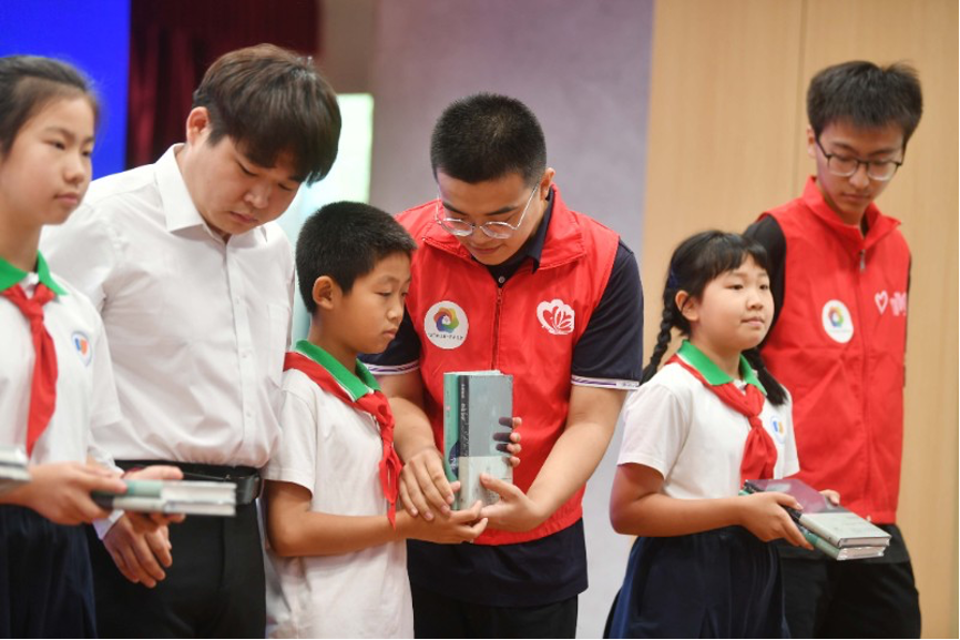 20230905-心博在线登录入口“‘京’彩文化 青春绽放”行动暑期活动纪实-供图-“书香未来”志愿行启动仪式现场.png